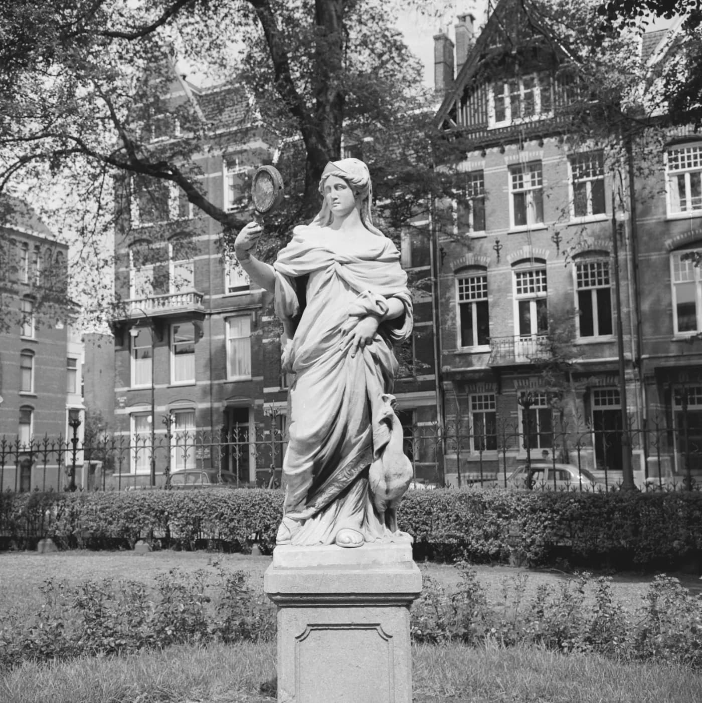 Rombout Verhulst's marble sculpture Juno with peacock and mirror