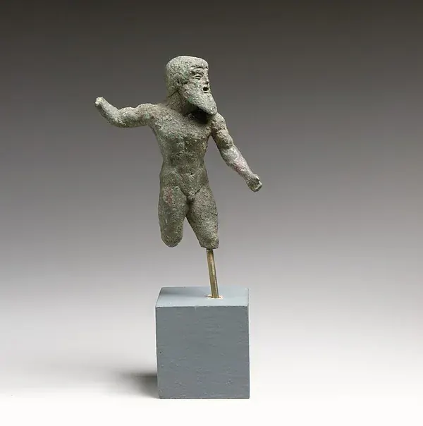 Small bronze statuette of Zeus or Poseidon with one arm raised